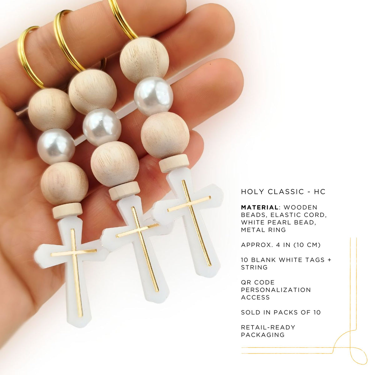 Wooden rosary beads with white pearls and gold crosses held in a hand, with product details on a white background.