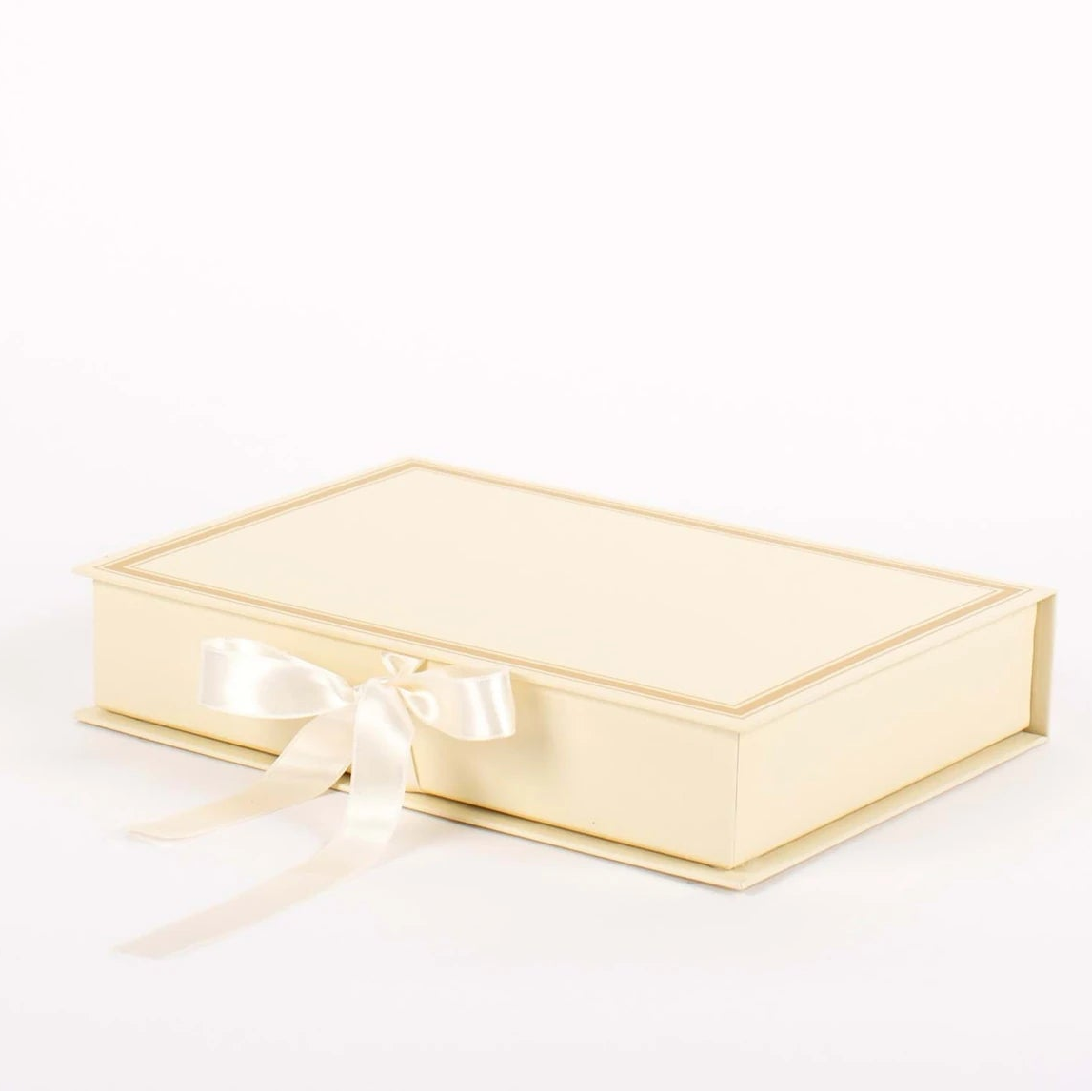 Gold gift box on a white background