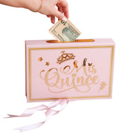 Pink 'Mis Quince' money box with a hand inserting money into it on a white background