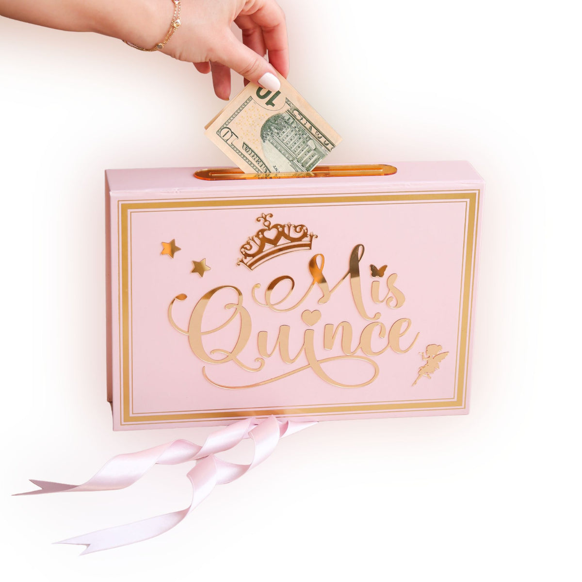 Pink gift bag with 'Mis Quince' text, money being inserted, on a white background