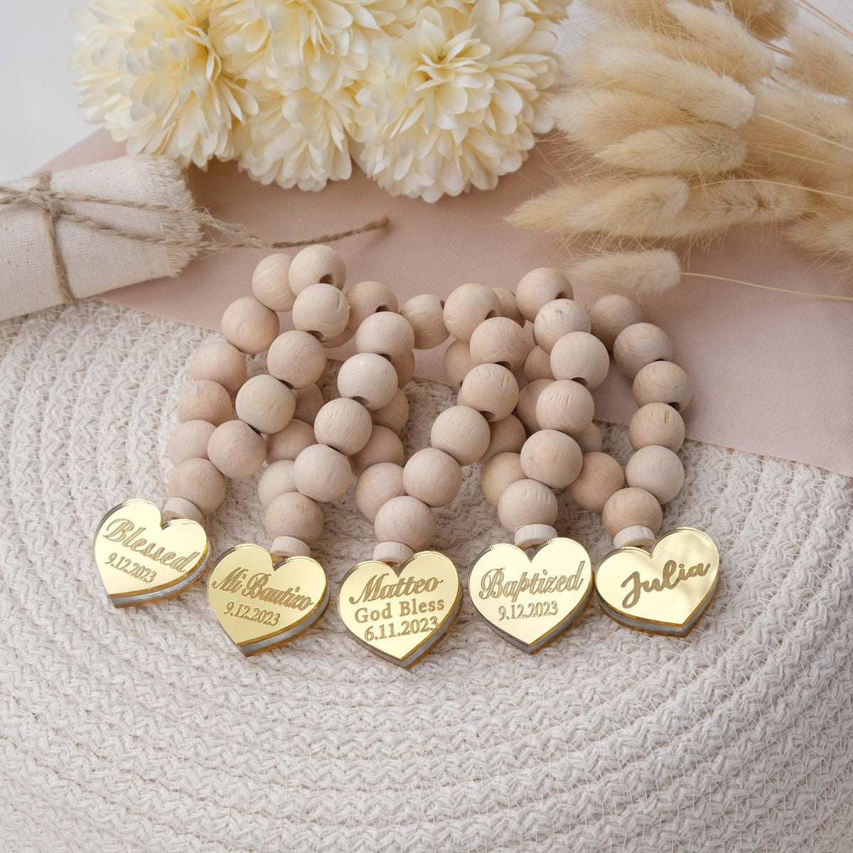 customised small wooden rosaries are fashioned from natural wood and come in a variety of hues. You may also add a personalization with the name and date of the baptism for a unique touch. Each rosary is 4 inches long and ends with a heart.